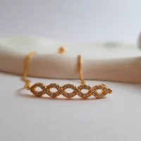 دستبند نگینی مارشال - طرح بی‌ نهایت طلایی